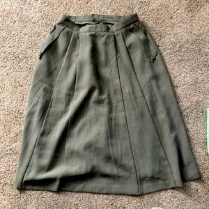 Olive pleated skirt.